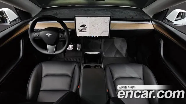 Tesla Model Y — Фото автомобиля 10