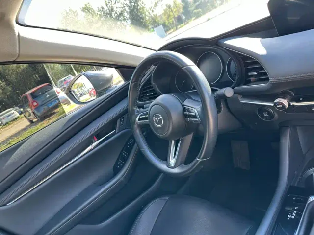 Mazda Axela — Фото автомобиля 18