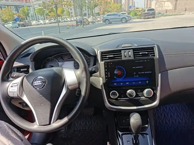 Nissan Tiida — Фото автомобиля 9