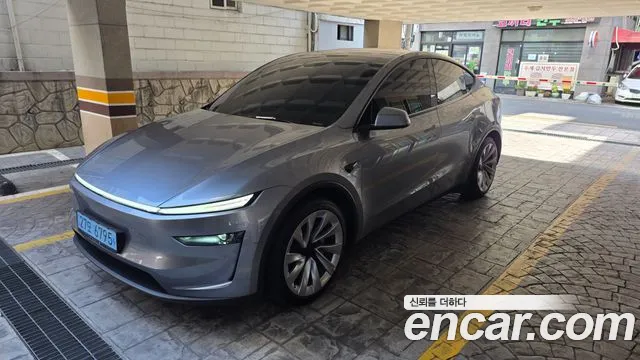 Tesla Model Y — Фото автомобиля 4