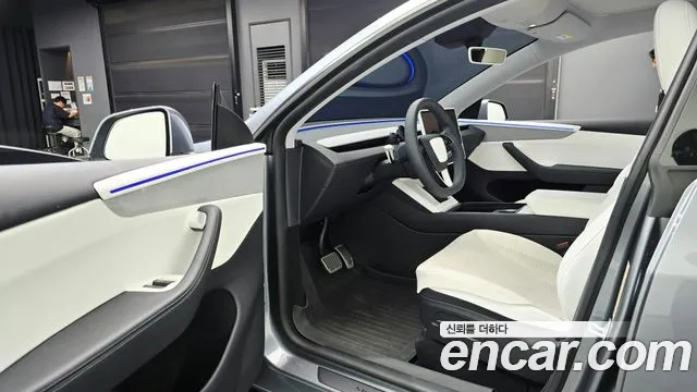 Tesla Model Y — Фото автомобиля 15