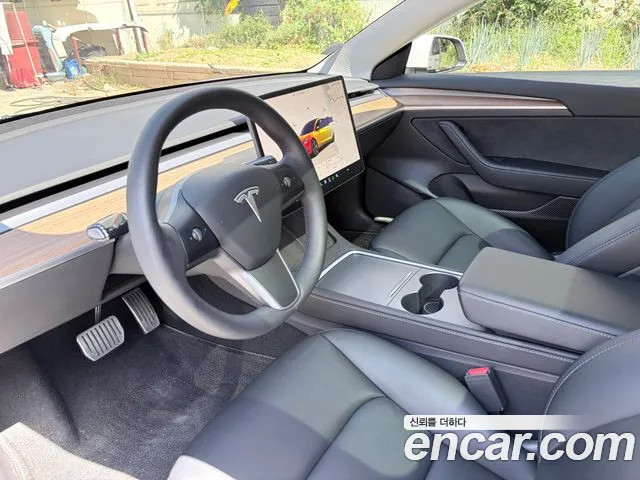 Tesla Model 3 — Фото автомобиля 13
