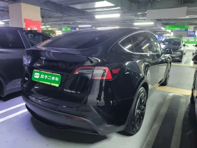 Tesla Model Y — Фото автомобиля 6