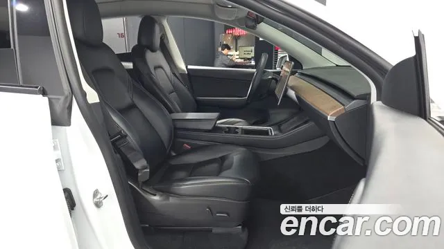 Tesla Model Y — Фото автомобиля 10