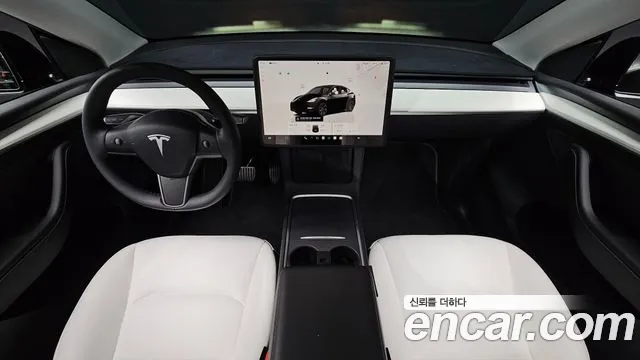 Tesla Model Y — Фото автомобиля 10
