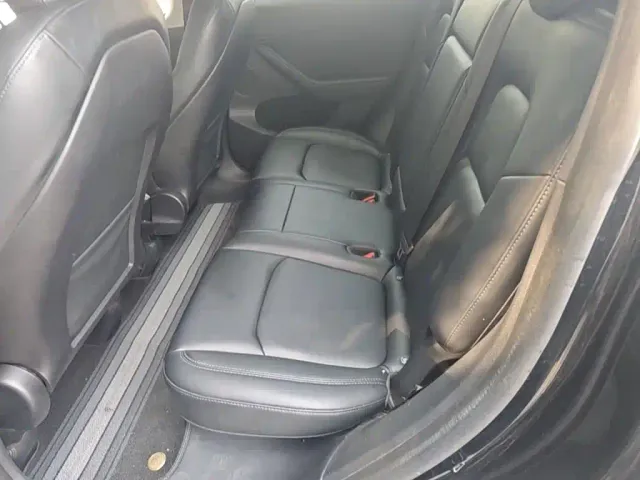 Tesla Model Y — Фото автомобиля 16