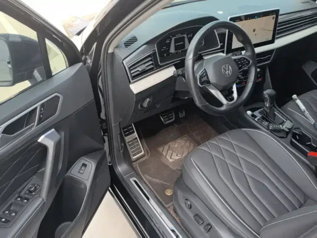 Volkswagen Tiguan L — Фото автомобиля 15