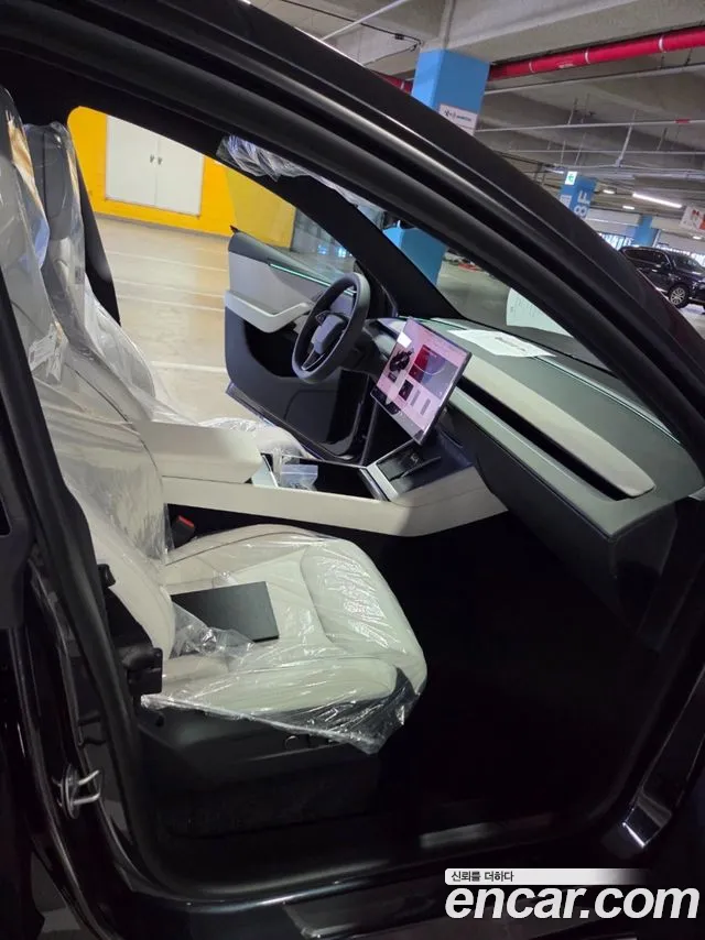 Tesla Model Y — Фото автомобиля 9