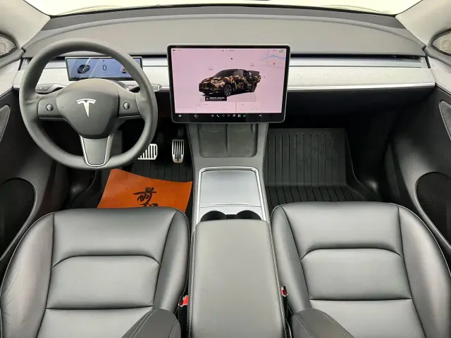 Tesla Model Y — Фото автомобиля 7
