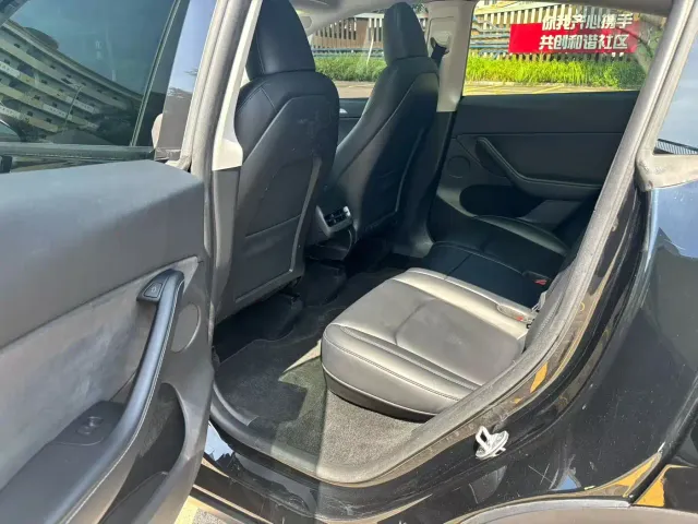 Tesla Model Y — Фото автомобиля 6