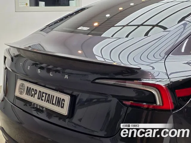 Tesla Model 3 — Фото автомобиля 6