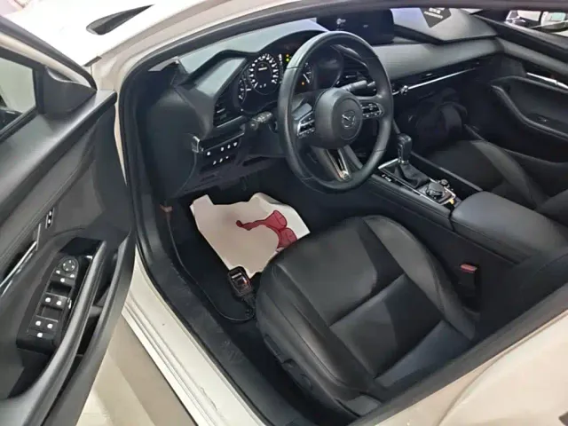 Mazda Axela — Фото автомобиля 15