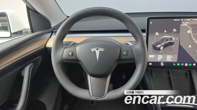 Tesla Model Y — Фото автомобиля 13