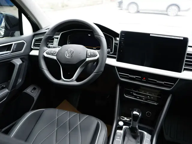 Volkswagen Tiguan L — Фото автомобиля 9