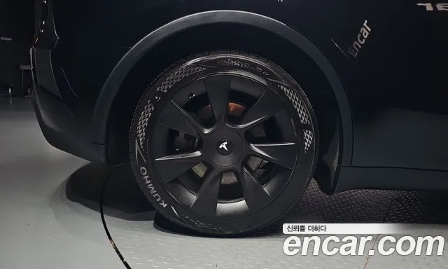 Tesla Model Y — Фото автомобиля 5