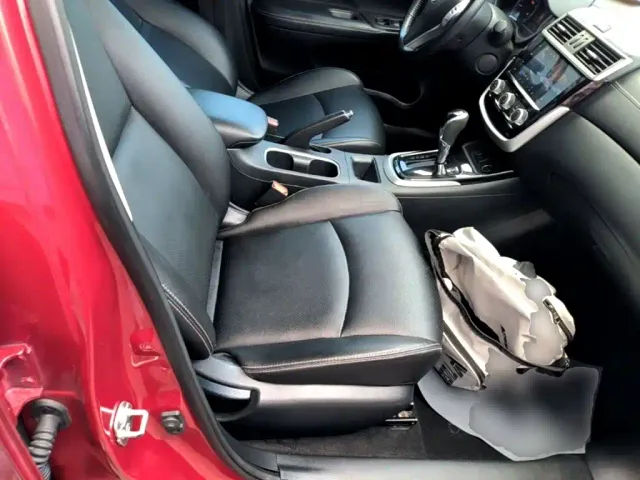 Nissan Tiida — Фото автомобиля 24