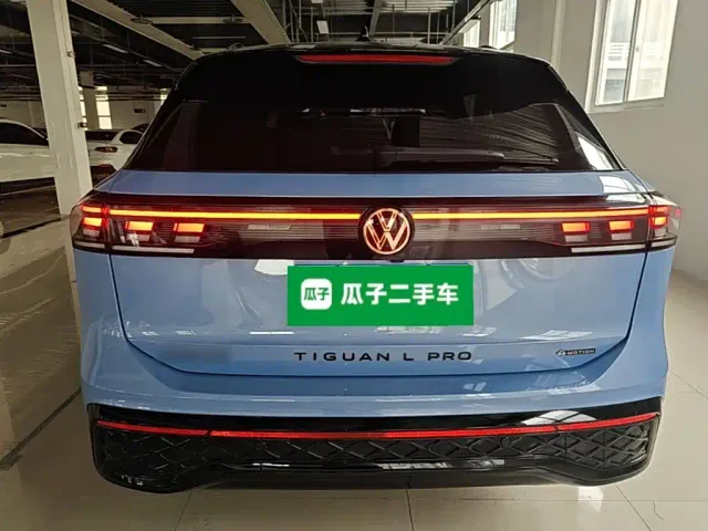 Volkswagen Tiguan L — Фото автомобиля 5