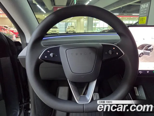 Tesla Model Y — Фото автомобиля 10