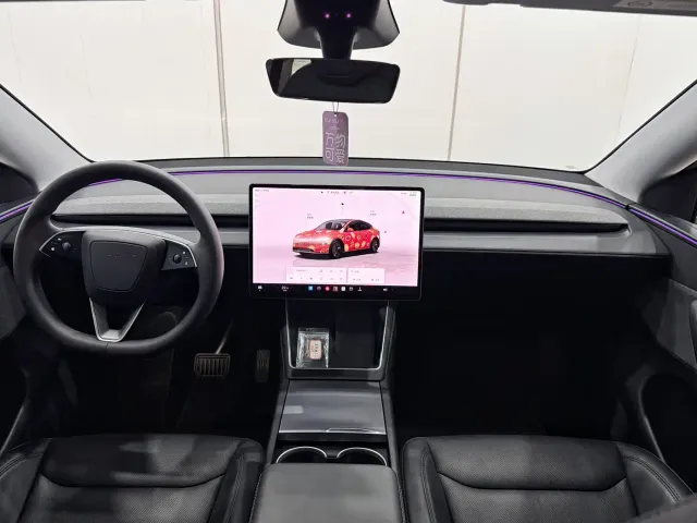Tesla Model Y — Фото автомобиля 10