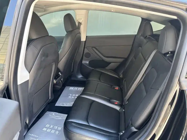 Tesla Model Y — Фото автомобиля 7