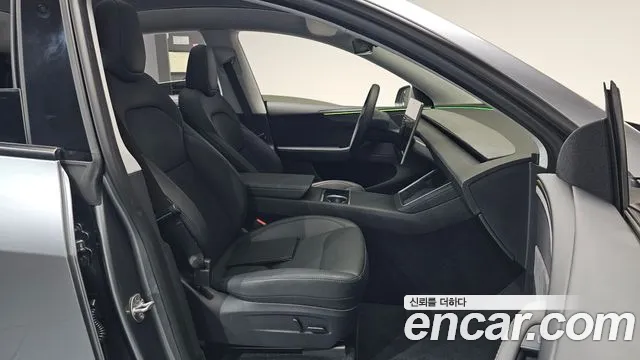 Tesla Model Y — Фото автомобиля 16
