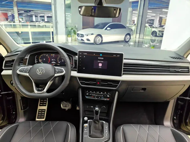 Volkswagen Tiguan L — Фото автомобиля 9