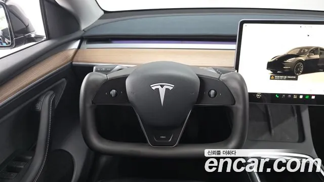 Tesla Model Y — Фото автомобиля 13