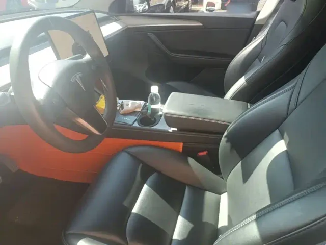 Tesla Model Y — Фото автомобиля 14