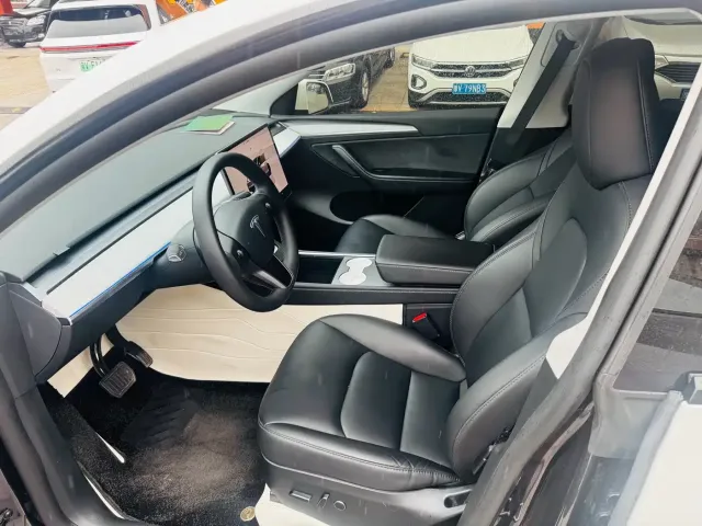 Tesla Model Y — Фото автомобиля 7