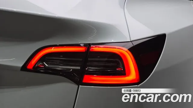 Tesla Model Y — Фото автомобиля 7