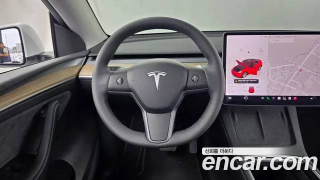 Tesla Model Y — Фото автомобиля 19