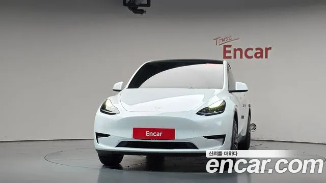 Tesla Model Y — Фото автомобиля 3