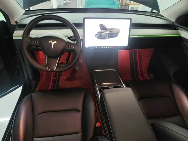 Tesla Model Y — Фото автомобиля 12