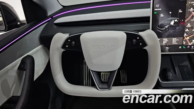 Tesla Model Y — Фото автомобиля 12