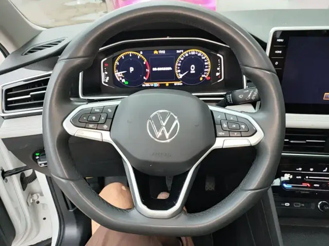 Volkswagen Tiguan L — Фото автомобиля 10
