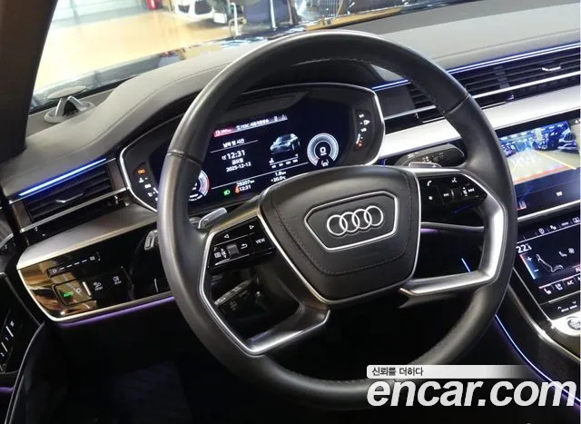 Audi A8 55 TFSI quattro Premium LWB — Фото автомобиля 12