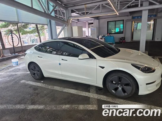 Tesla Model 3 — Фото автомобиля 11