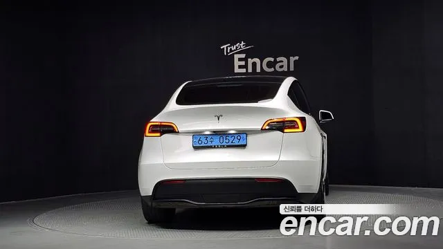 Tesla Model Y — Фото автомобиля 4