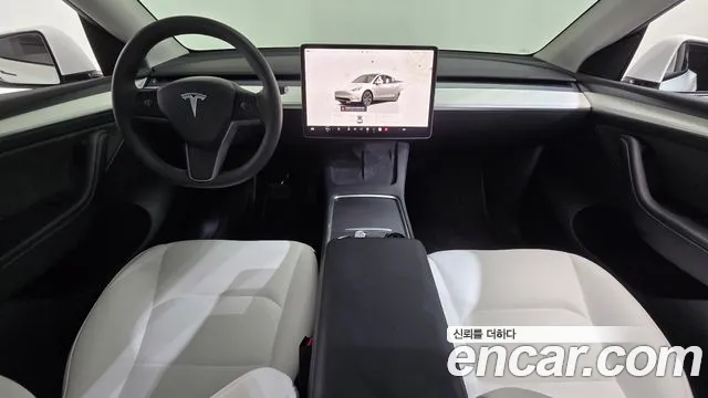 Tesla Model Y — Фото автомобиля 6