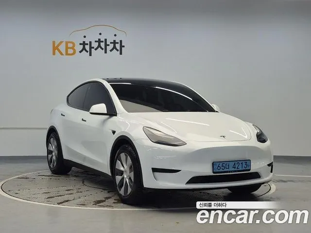 Tesla Model Y — Фото автомобиля 4