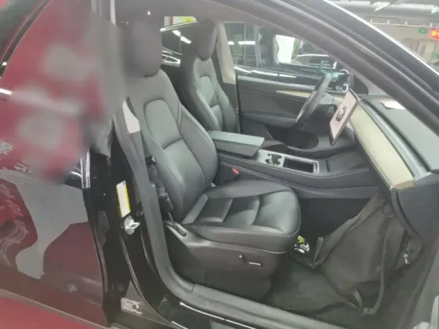 Tesla Model Y — Фото автомобиля 24