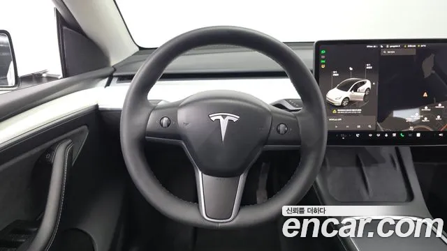 Tesla Model Y — Фото автомобиля 19