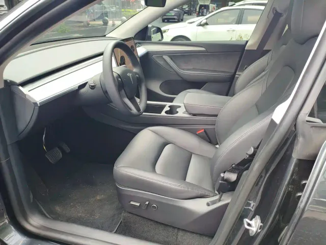 Tesla Model Y — Фото автомобиля 7