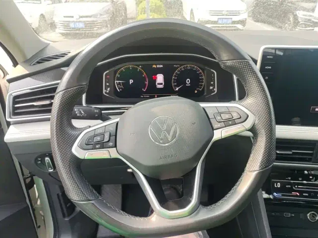 Volkswagen Tiguan L — Фото автомобиля 10