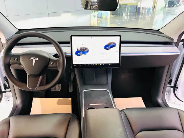 Tesla Model Y — Фото автомобиля 8