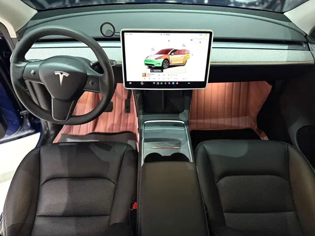 Tesla Model Y — Фото автомобиля 9