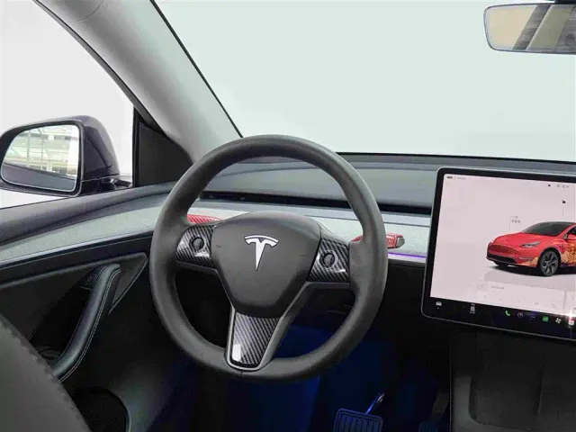 Tesla Model Y — Фото автомобиля 7