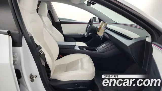 Tesla Model 3 — Фото автомобиля 11