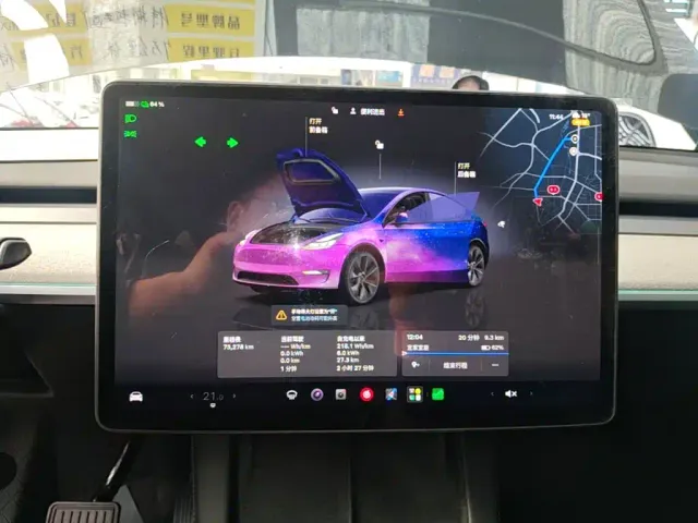 Tesla Model Y — Фото автомобиля 11