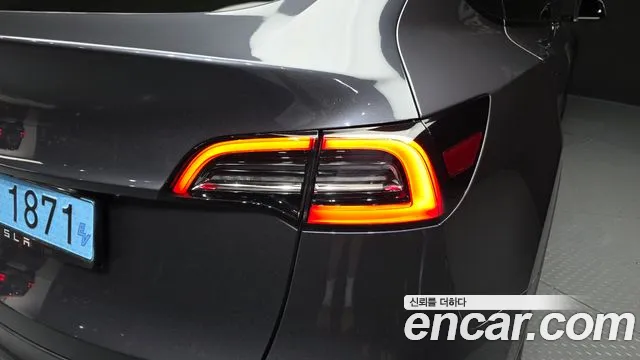 Tesla Model Y — Фото автомобиля 7